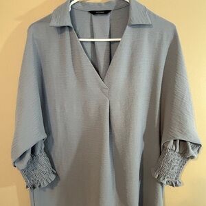 Relaxed V-Neck Smocked Cuff Blouse in Light Blue